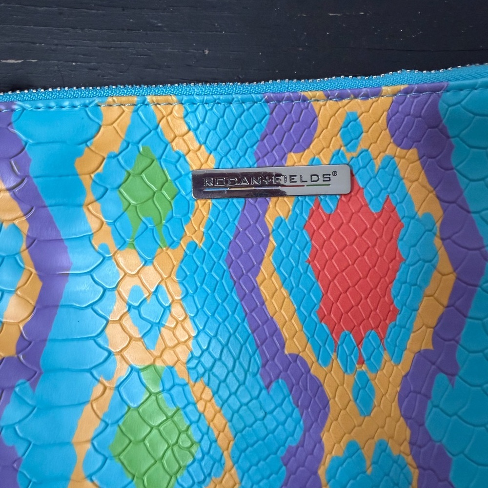 Rodan + Fields Multicolor Cosmetic Bag